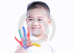 Happy asian child kid smile on education art show hand with water color or finger paint on hands