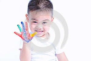 Happy asian child kid smile on education art show hand with water color or finger paint on hands