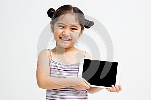 Happy Asian child with tablet computer