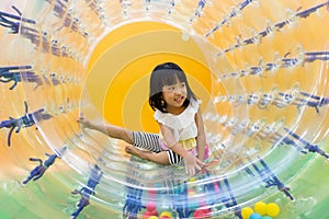 Happy Asian Chinese Little Girl Playing Roller Wheel