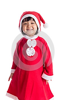 Happy Asian Chinese little girl wearing santa claus costume