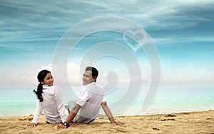 Happy asian couple at beach