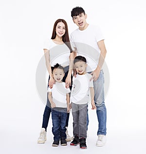 Happy Asian family standing together on white background