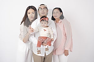 Happy Asian family on white background