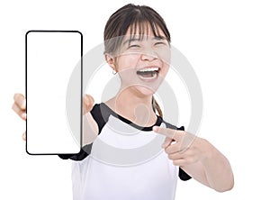 Happy Asian girl holding smartphone mockup of blank screen