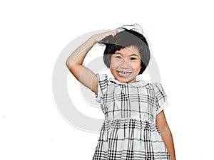 Happy Asian girl scratching her head