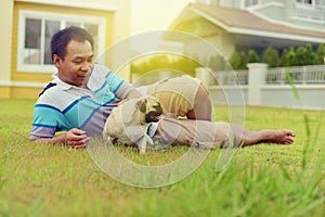 Happy Asian man with dog