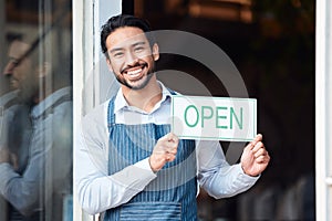 Happy asian man, small business and portrait with open sign for service in coffee shop or restaurant. Male entrepreneur