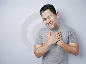 Happy Asian Man Smiling and Pointing Himself