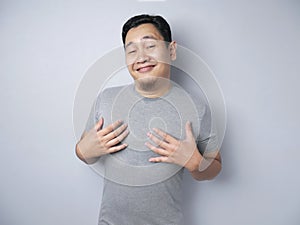 Happy Asian Man Smiling and Pointing Himself