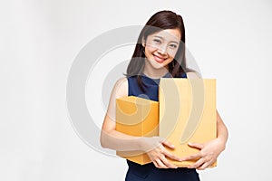 Happy Asian woman holding package parcel box,