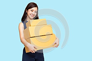 Happy Asian woman holding package parcel box.