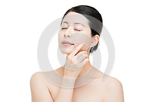 Happy asian woman model hand touch perfect skin face