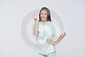 Happy asian woman patient showing heart isolated on white background. life insurance concept