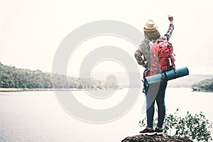 Happy Asian woman relaxing on holiday travel concept