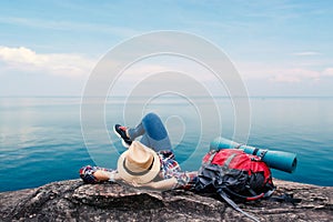 Happy Asian woman relaxing on holiday travel concept