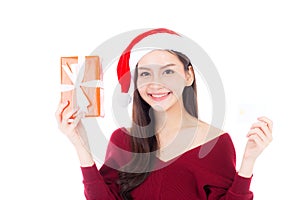 Happy asian woman with smile holding gift box and credit card