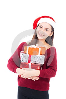 Happy asian woman with smile holding gift box many of xmas