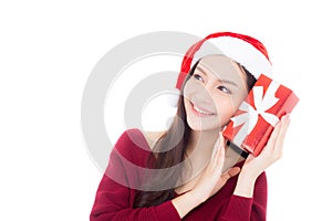 Happy asian woman with smile holding gift box of xmas