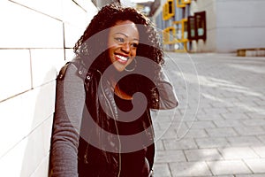 Happy Attractive Black Woman in Jacket