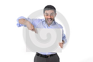 Happy attractive businessman holding blank billboard as copyspace