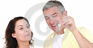 Happy attractive couple holding new house key