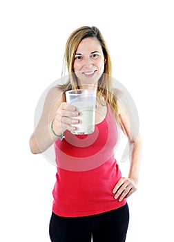 Happy attractive mature woman on her 40s drinking milk in health concept