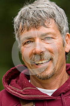 Happy attractive smiling worker