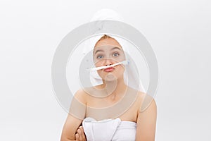 Happy attractive woman playing with tooth brush on copy space, isolated on white