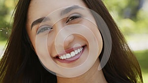 Happy Attractive Young Woman Smiling Looking At Camera Standing Outdoors