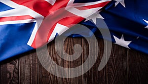 Happy Australia day concept. Australian flag against old wooden background. 26 January
