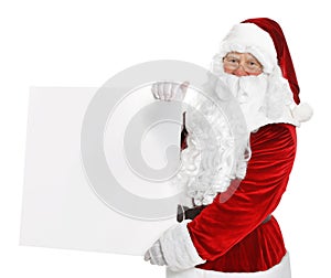 Happy authentic Santa Claus with blank banner on background. Space for design