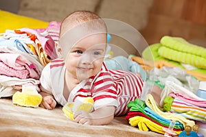 Happy baby with baby's wear