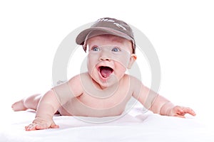 Happy baby in a baseball cap