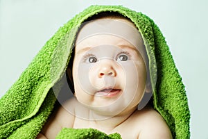 Happy baby and bath towel