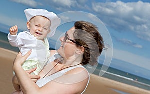 Happy baby at the beach.