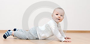 Happy baby boy crawling