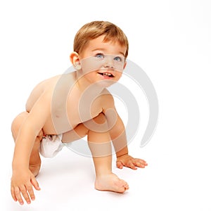 Happy baby boy in diapers isolated on white