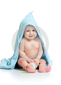 Happy baby boy in towel