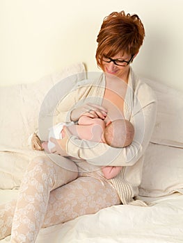 Happy baby breastfeeding