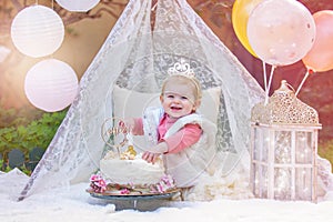 Happy baby with cake smash birthday party