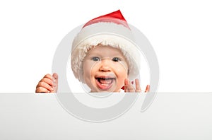 Contento un bambino Berretto di Natale un vuoto cartelloni pubblicitari sul 