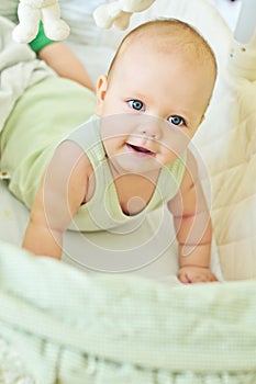 Happy baby in crib