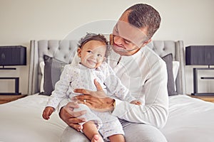 Happy baby and father relax in a bedroom portrait for love, support and child care. Excited, happiness of dad holding