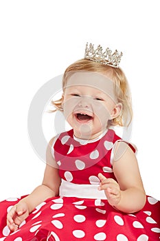 Happy baby girl with crown