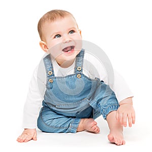 Happy Baby, Infant Kid Sitting on white, One year old Child in Jeans