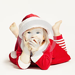 Happy Baby in Santa Hat. Child Laughing