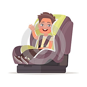 Happy baby sitting in the child car seat. Armchair for the child for safe movement on the vehicle