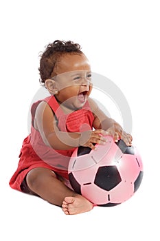Happy baby with soccer ball