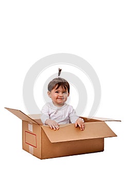 Happy baby in surprise box